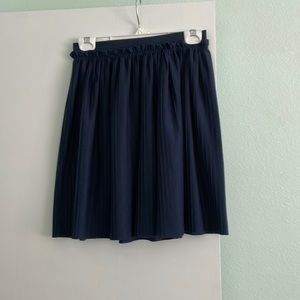 A navy blue skirt
